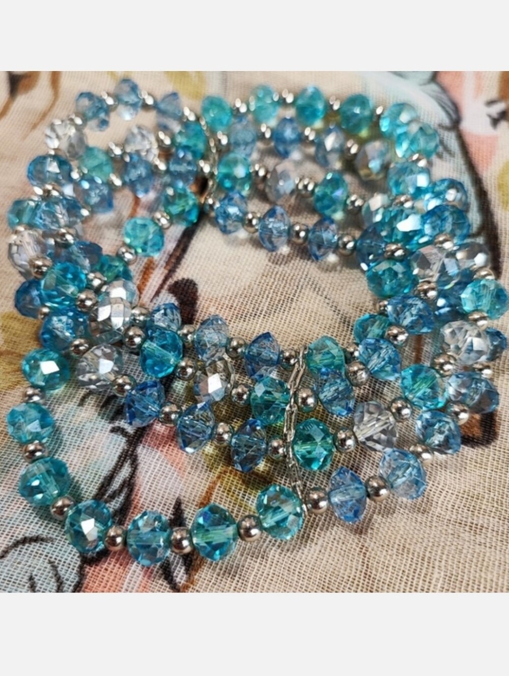 Azure Blue Faceted Glass Crystal Roll On 4 Strand Stretch Silver Tone Bracelet
